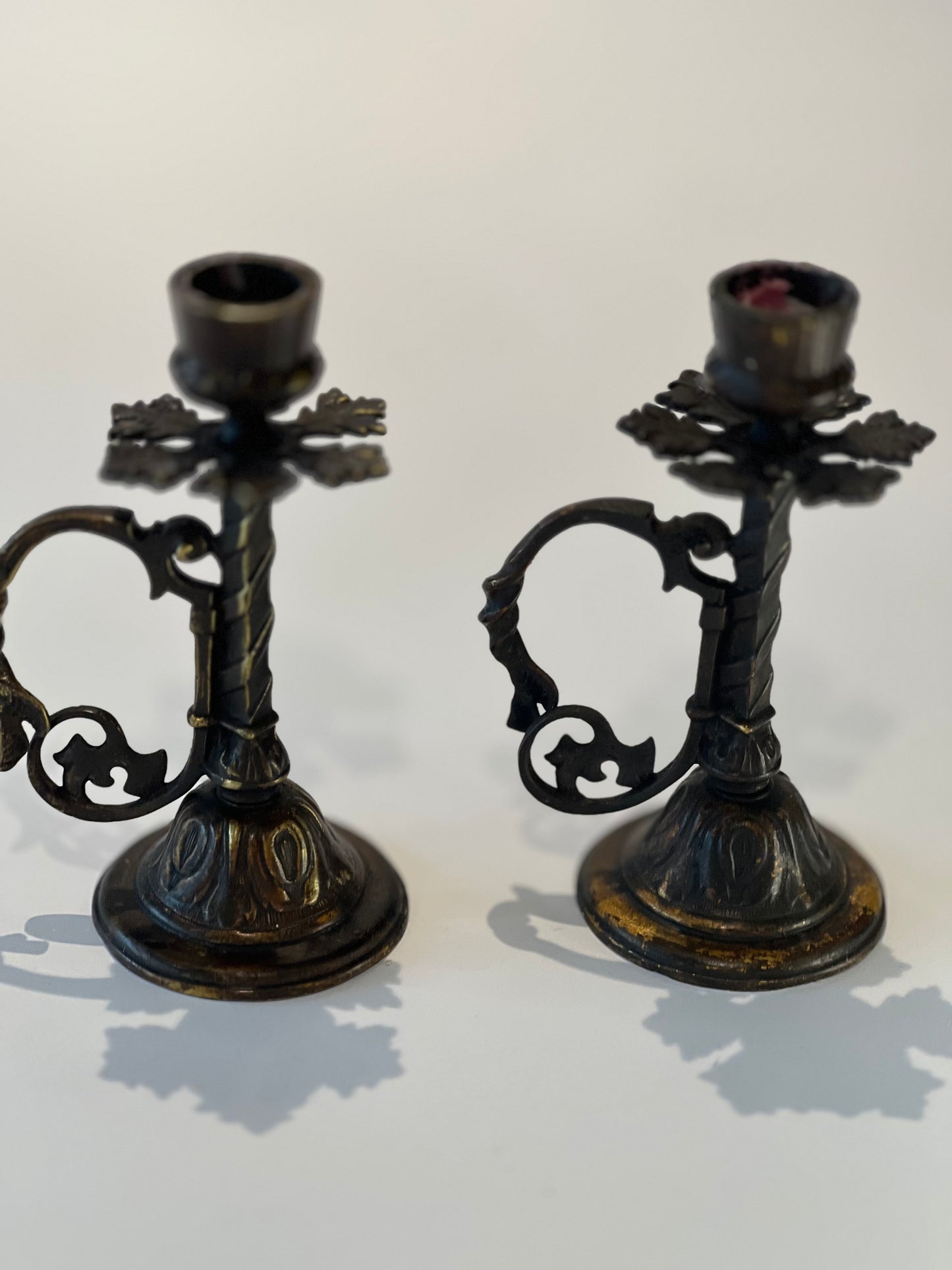 Pair of vintage metal candle holders